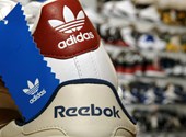 Adidas can sell Reebok for about half of what they bought it